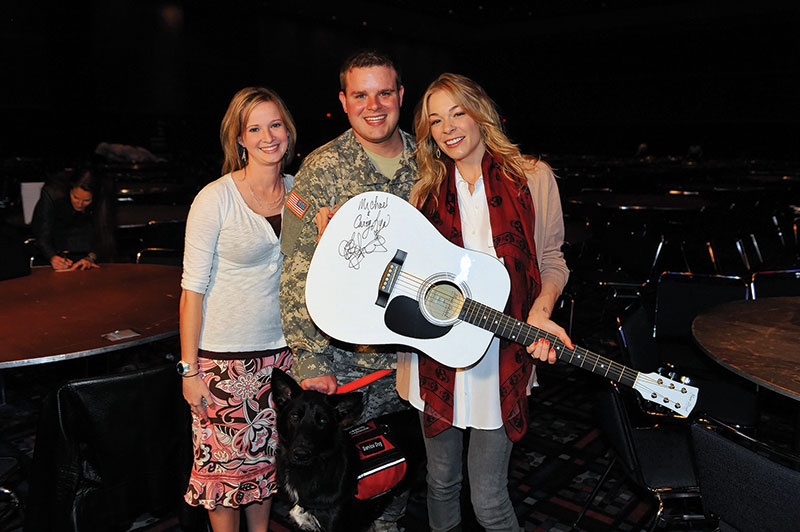 NAPE says thank you to an American Hero: Sgt. Michael Ryan, with his wife, Cary (left), and country music artist LeAnn Rimes.