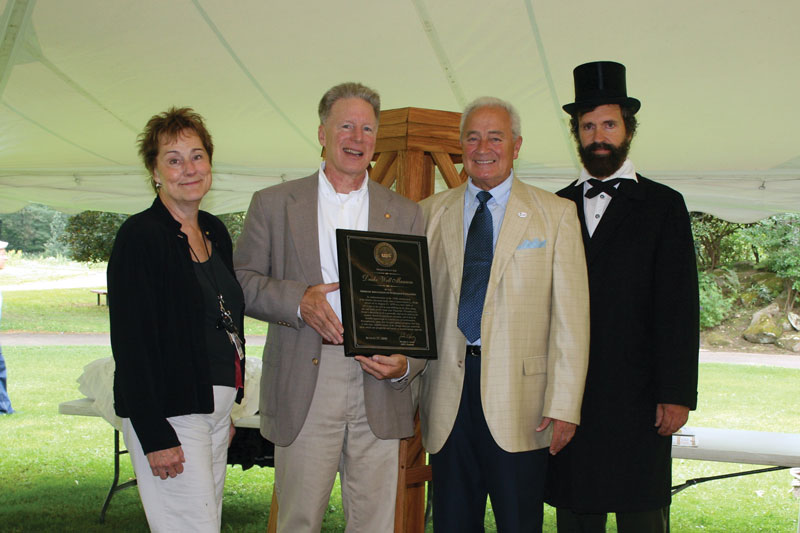 AAPG President John Lorenz presented a plaque from AAPG commemorating the 150th anniversary of the Col. Edwin Drake discovery of oil in Titusville, Pa., during ceremonies in late August at the Drake Museum in Titusville. From left is Barbara Zolli, director of the DrakeWell Museum, Lorenz, AAPG member Larry Woodfork – a member of the Oil 150 Celebration Committee – and, of course, Col. Edwin Drake (as per a locally hired actor).