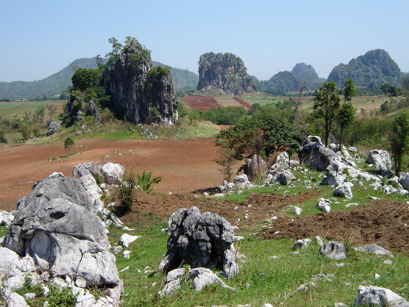 Permian limestone in Loei, northeastern Thailand. Discontinuous karst topography here resulted from erosion of limestone intercalated with clastic and volcaniclastic material.