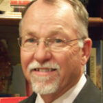 Wayne K. Camp